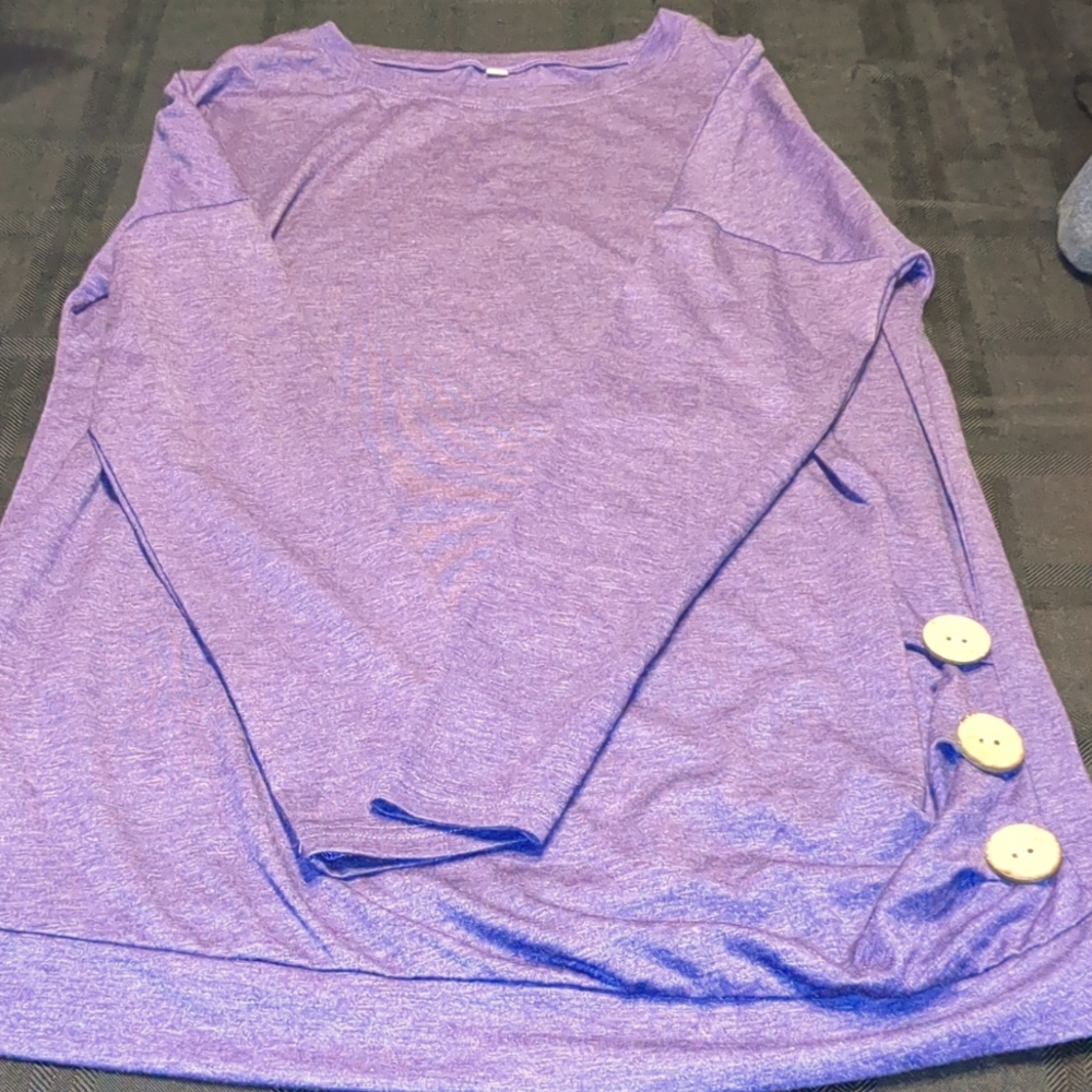 Purple long sleeve top.